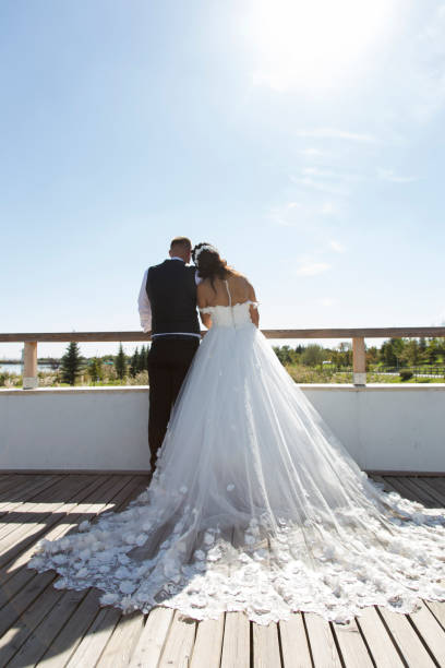 istock Happy bride and groom on their wedding day. 1084711156
