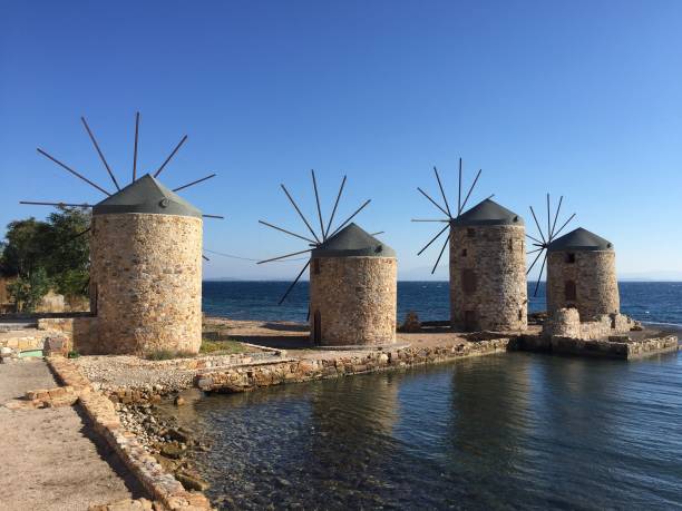 istock wind mill near sea 1084716852