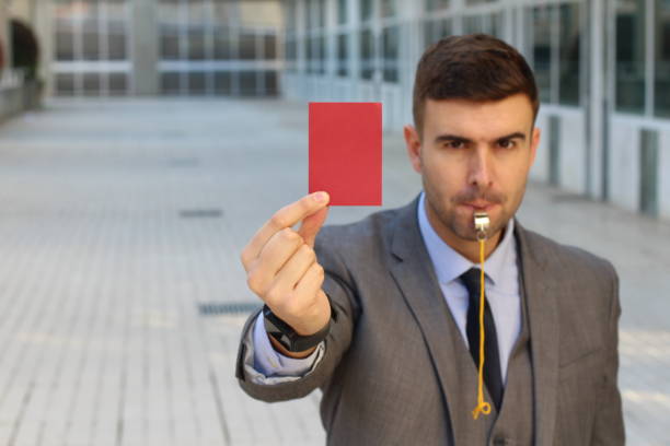 istock Businessman punishing an employee with copy space 1084728596
