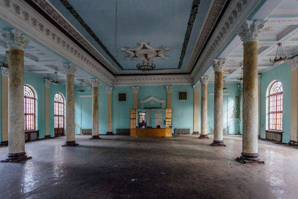 istock Interior of large column hall with fretwork at abandoned mansion 1084730312