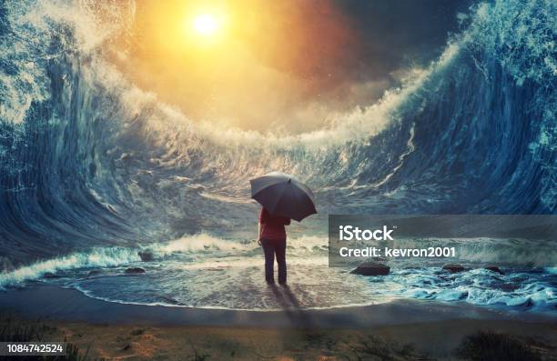 Woman And Tidal Wave Stock Photo - Download Image Now - Tsunami, Surreal, Rain