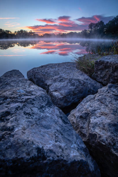 istock Foggy Lake at Sunrise 1084744316