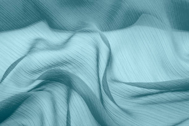 istock Texture chiffon fabric blue color for backgrounds 1084744396