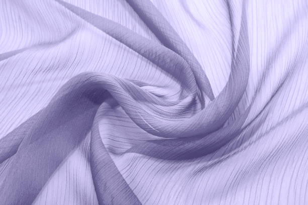 istock Texture chiffon fabric lilac color for backgrounds 1084744420