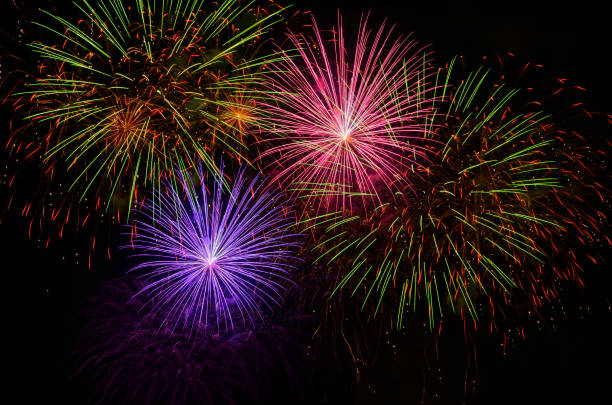 istock Colorful fireworks celebration and the night sky background. 1084752802