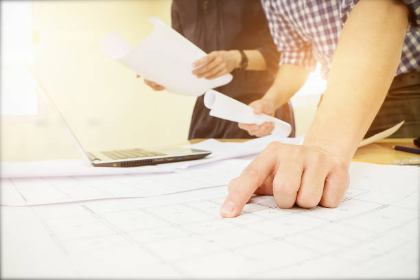 istock Image of engineer meeting for architectural project. working with partner and engineering tools on workplace 1084760974