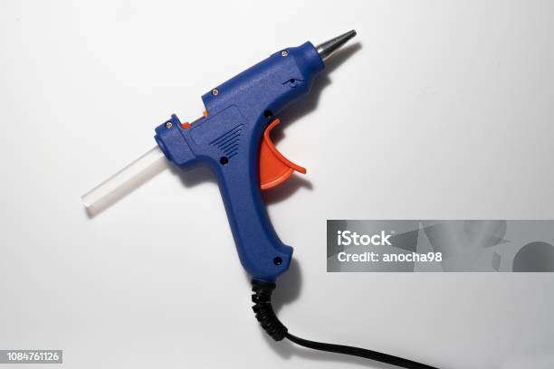 Glue Gun Blue Isolated Stock Photo - Download Image Now - Pistol, Silicone, Glue