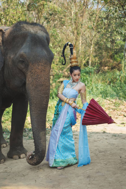 istock Thai Woman In Traditional Costume 1084767894