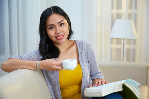 istock Young woman resting at home 1084768642
