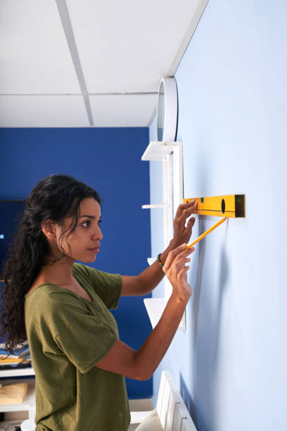 istock Young woman designing her room 1084773628
