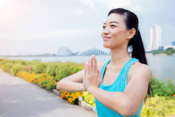 istock Woman in prayer position 1084773826