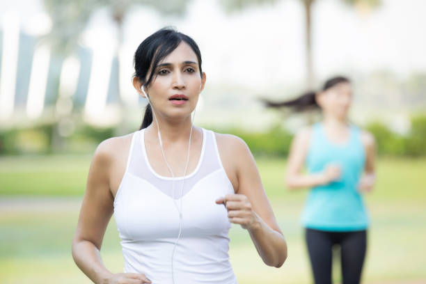 istock Tired woman finishes up workout 1084773866