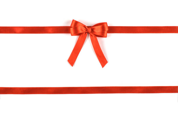 istock Shiny red silk ribbon on white background. 1084775290