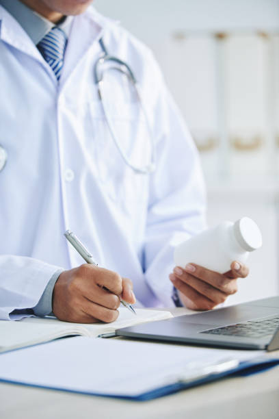 istock Doctor writing down prescription 1084777094
