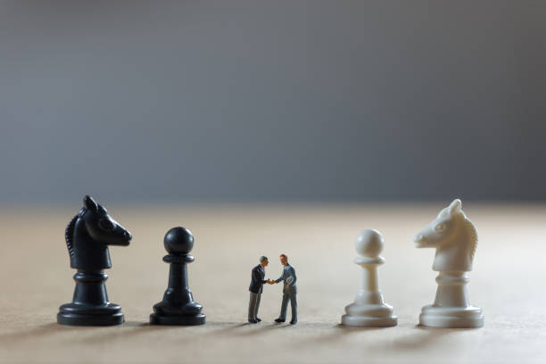 istock Businessman shaking hands. Business strategy concept 1084786356