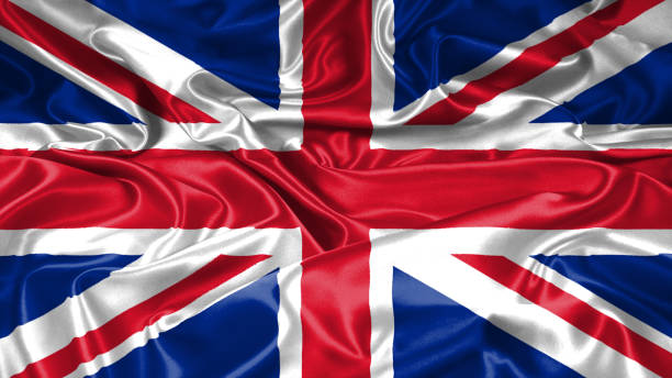istock British England Royalty flag on silk satin texture 1084788524