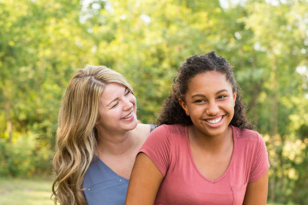 istock Mother and daughter smiling. 1084789982