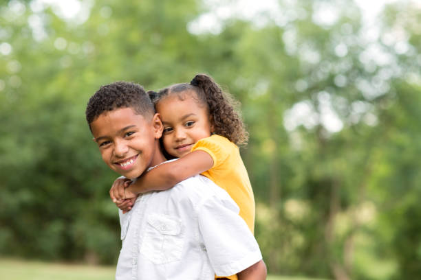 istock Big brother and his little sister. 1084790036