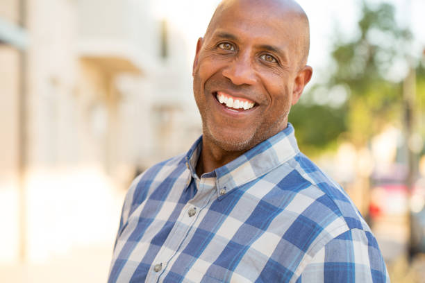 istock Happy mature African American man smiling 1084790116
