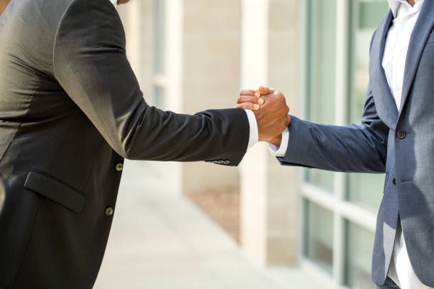 istock African American businessmen shaking hands 1084790180