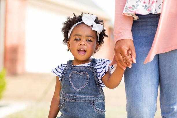 istock African American mother and her daughter. 1084790438