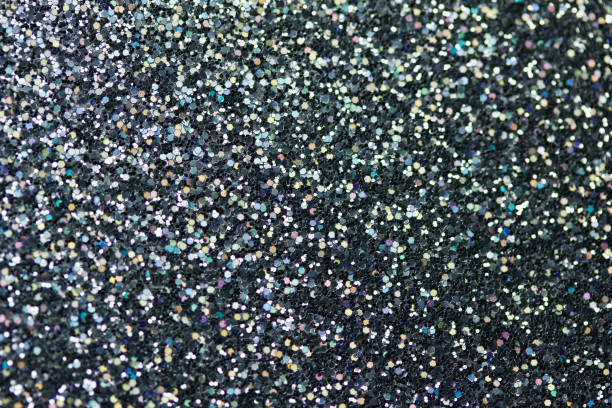 istock Macro sparkling silver black glitter bokeh abstract background 1084791646