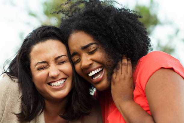 istock Multi-ethnic group of friends laughing. 1084793354