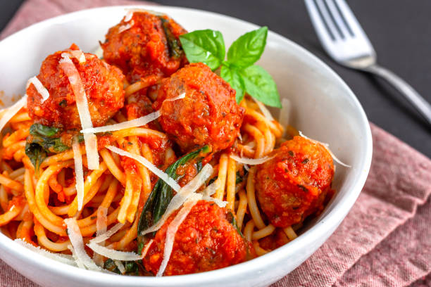 istock Spaghetti with meatballs and Basil Leaves 1084800848