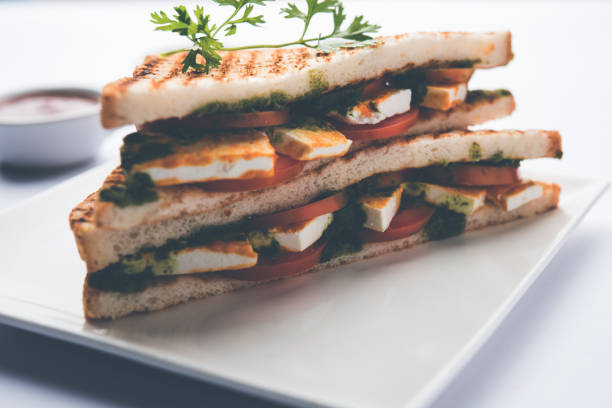 istock Paneer Sandwich - using Indian cottage cheese and vegetables and chutney 1084808464