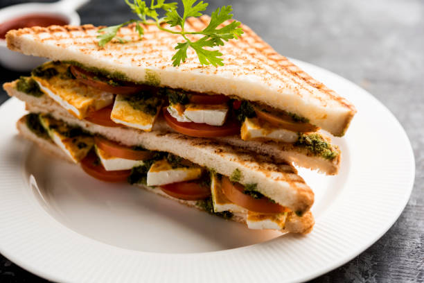 istock Paneer Sandwich - using Indian cottage cheese and vegetables and chutney 1084809554