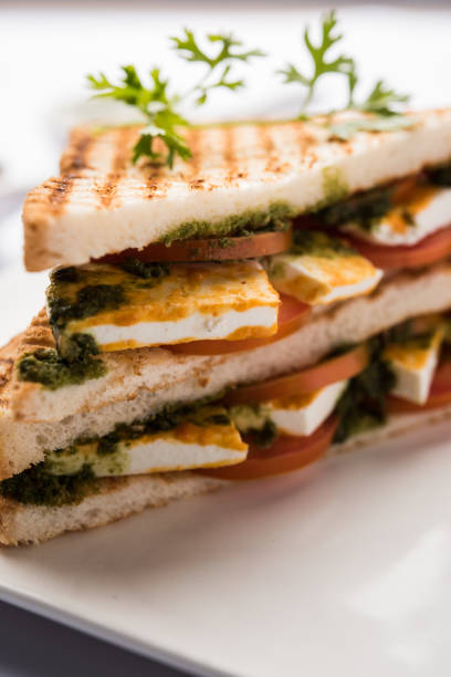 istock Paneer Sandwich - using Indian cottage cheese and vegetables and chutney 1084809622
