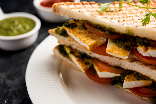 istock Paneer Sandwich - using Indian cottage cheese and vegetables and chutney 1084809780