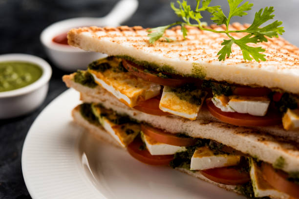 istock Paneer Sandwich - using Indian cottage cheese and vegetables and chutney 1084809826