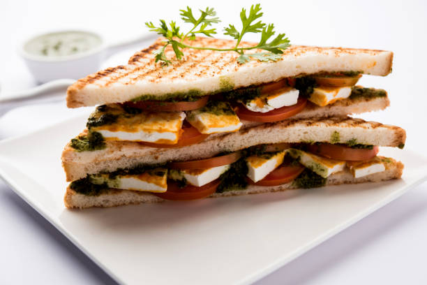 istock Paneer Sandwich - using Indian cottage cheese and vegetables and chutney 1084809932