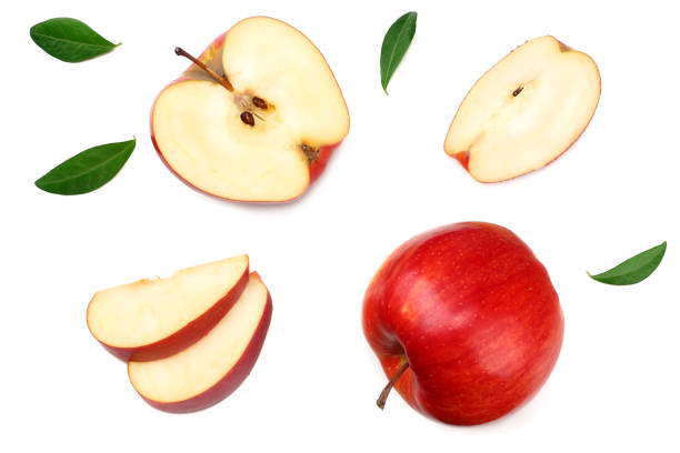 istock red apples with slices isolated on white background. top view 1084812818