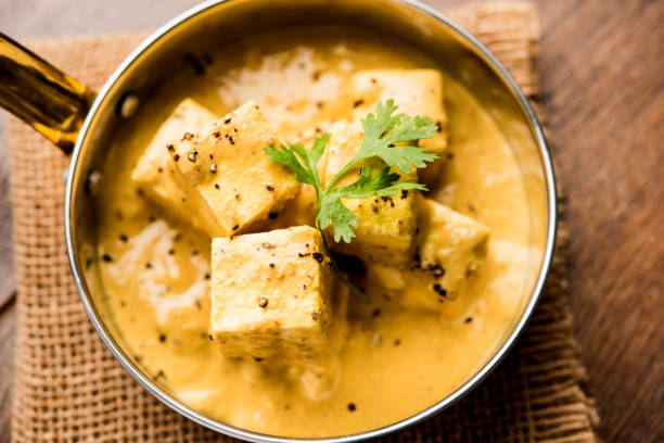 istock Malai or achari Paneer in a gravy made using Whipping Cream. served on a serving pan. selective focus 1084813724