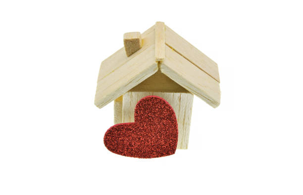 istock wooden house and heart 1084824082