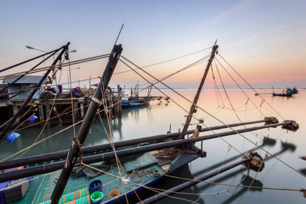 istock Fishing Boat In Harbor At Morning 1084826526