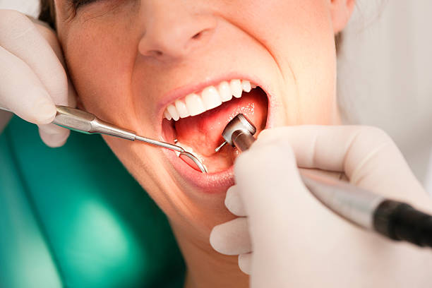 istock Patient with Dentist - dental treatment 108482733