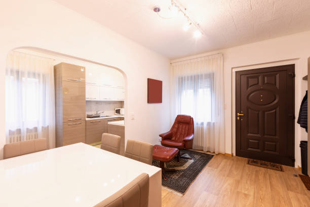 istock Entry with table, chairs and armchair 1084828990