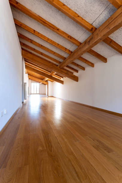 istock Empty room with parquet and window overlooking the castle 1084832046