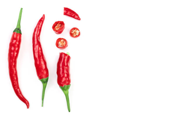 istock red hot chili peppers isolated on white background. Top view. Flat lay pattern 1084832526