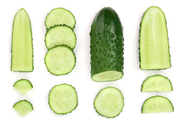 istock Cucumber slices isolated on white background. Top view. Flat lay pattern. Set or collection 1084832632