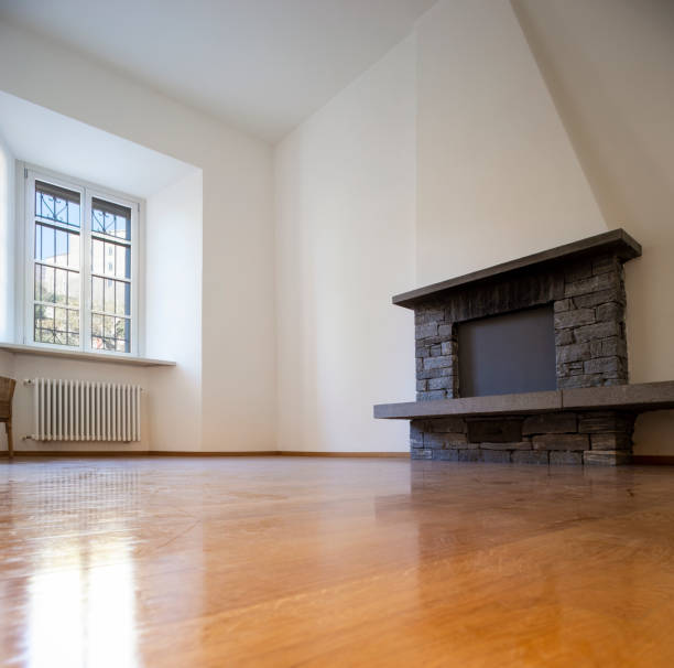 istock Empty room with parquet and window overlooking the castle 1084834164
