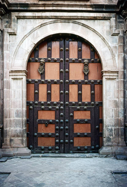 istock Old vintage door on Cathedral, Cusco 1084844022