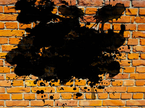 istock grunge aged brick wall with black ink splatter splash drops brush stroke art abstract background empty blank design element 1084844290