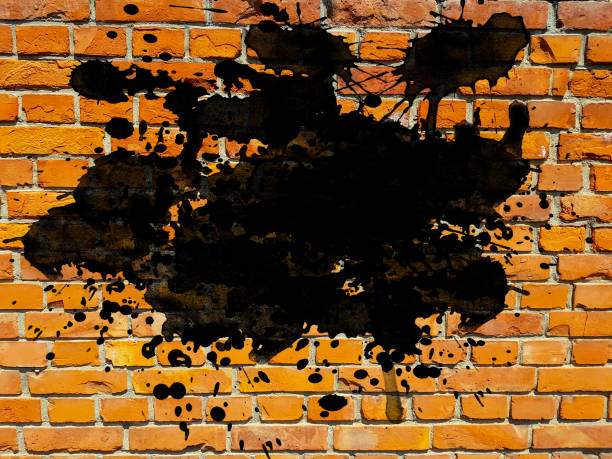 istock grunge aged brick wall with black ink splatter splash drops brush stroke art abstract background empty blank design element 1084844292