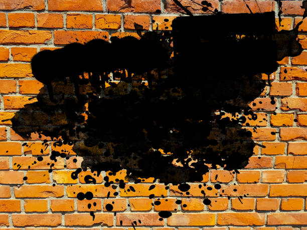 istock grunge aged brick wall with black ink splatter splash drops brush stroke art abstract background empty blank design element 1084844436