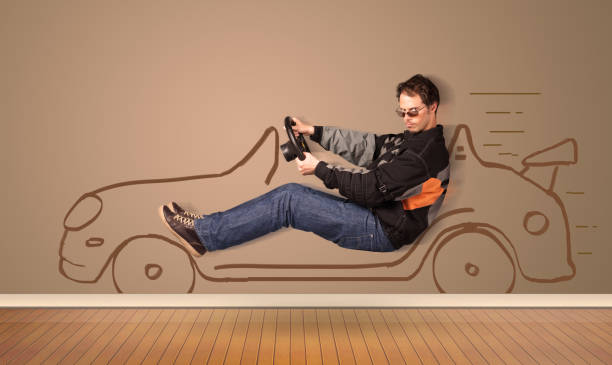 istock Happy man driving an hand drawn car on the wall 1084851568
