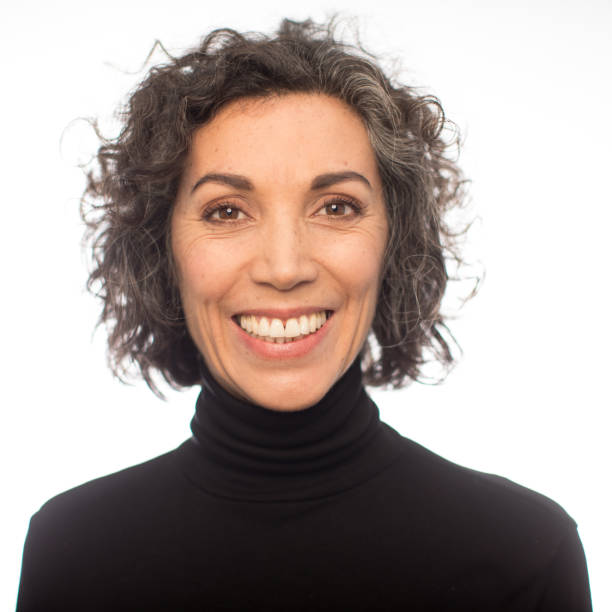 istock Smiling mature woman against white background 1084853374